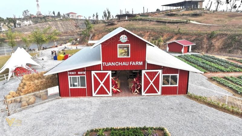 Red wooden houses with a European breath at Tuan Chau Farm